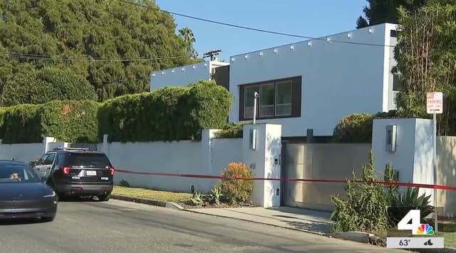 <p>Robin Kaye and her husband, Thomas Deluca, were found fatally shot in their suburban Los Angeles home, shown here</p>
